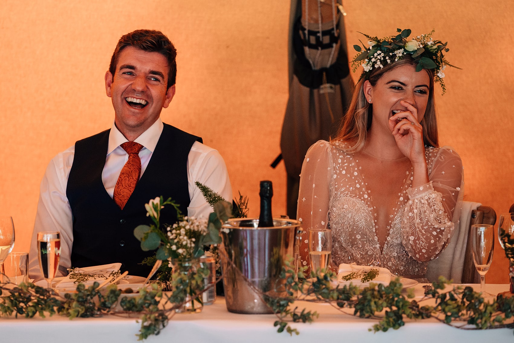 documentary photography of the bride and groom during wedding speeches