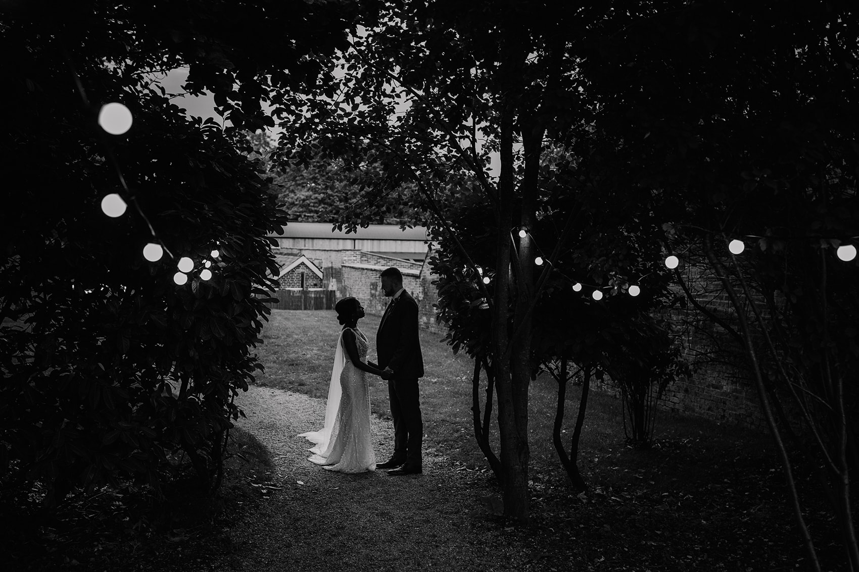 black and white photography of bride and groom woodland wedding